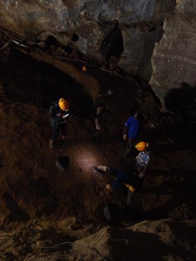 Researchers exploring Milner Hall in the Sterkfontein Caves.